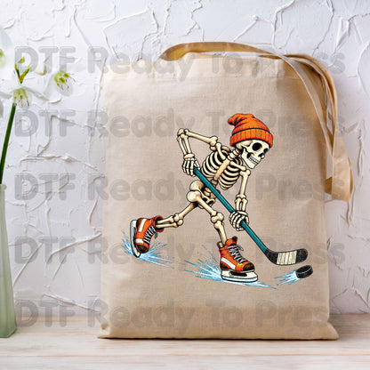 Hockey DTF Transfer, Skeleton in Beanie with Skates, Stick and Puck Graphic