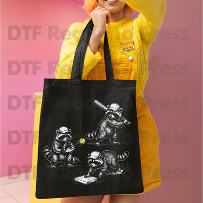 Baseball DTF Transfer, Raccoons Playing Baseball with Yellow Ball Graphic